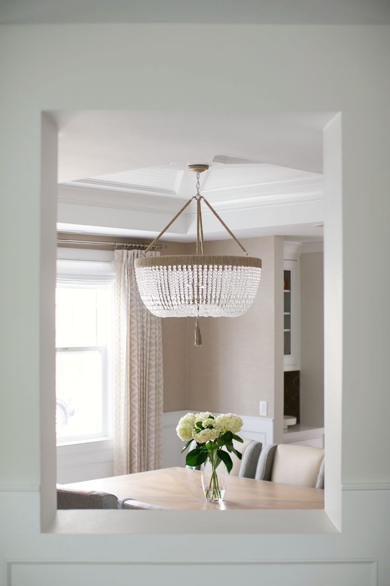 View through to the dining room and beaded chandelier
