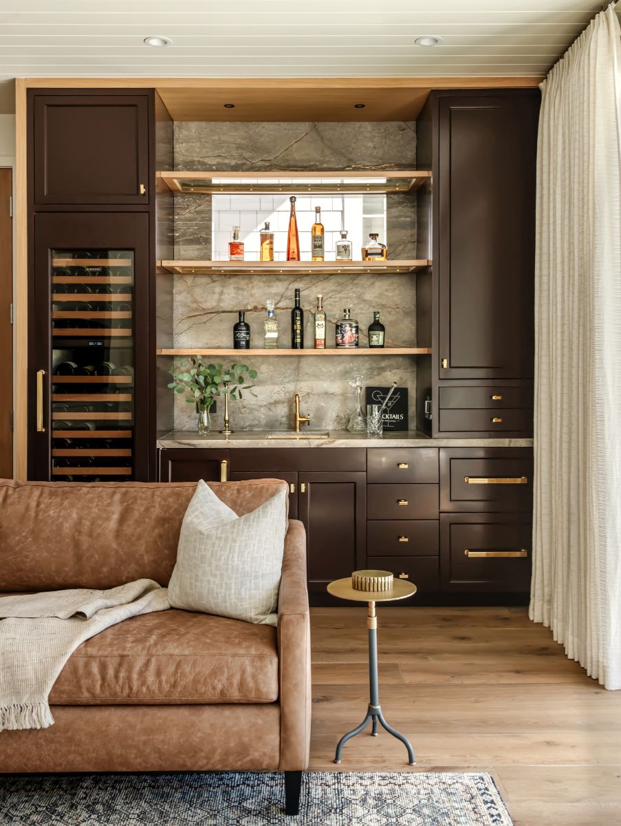 Dark-stained bar with wine column and glass shelving
