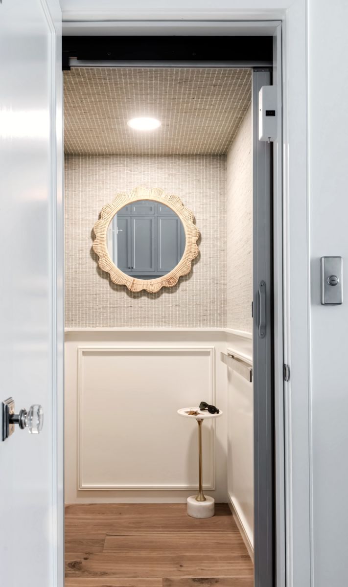 Panelled niche with scalloped mirror