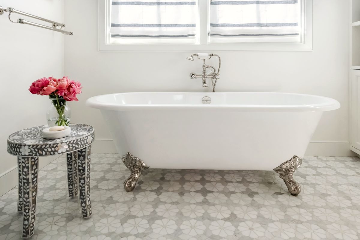 Clawfoot tub with mother-of-pearl side table